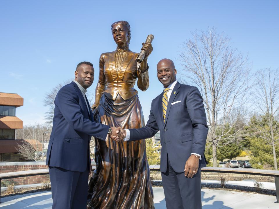 Sculpture artist, Rev. Frederick Hightower, with President Jenkins.